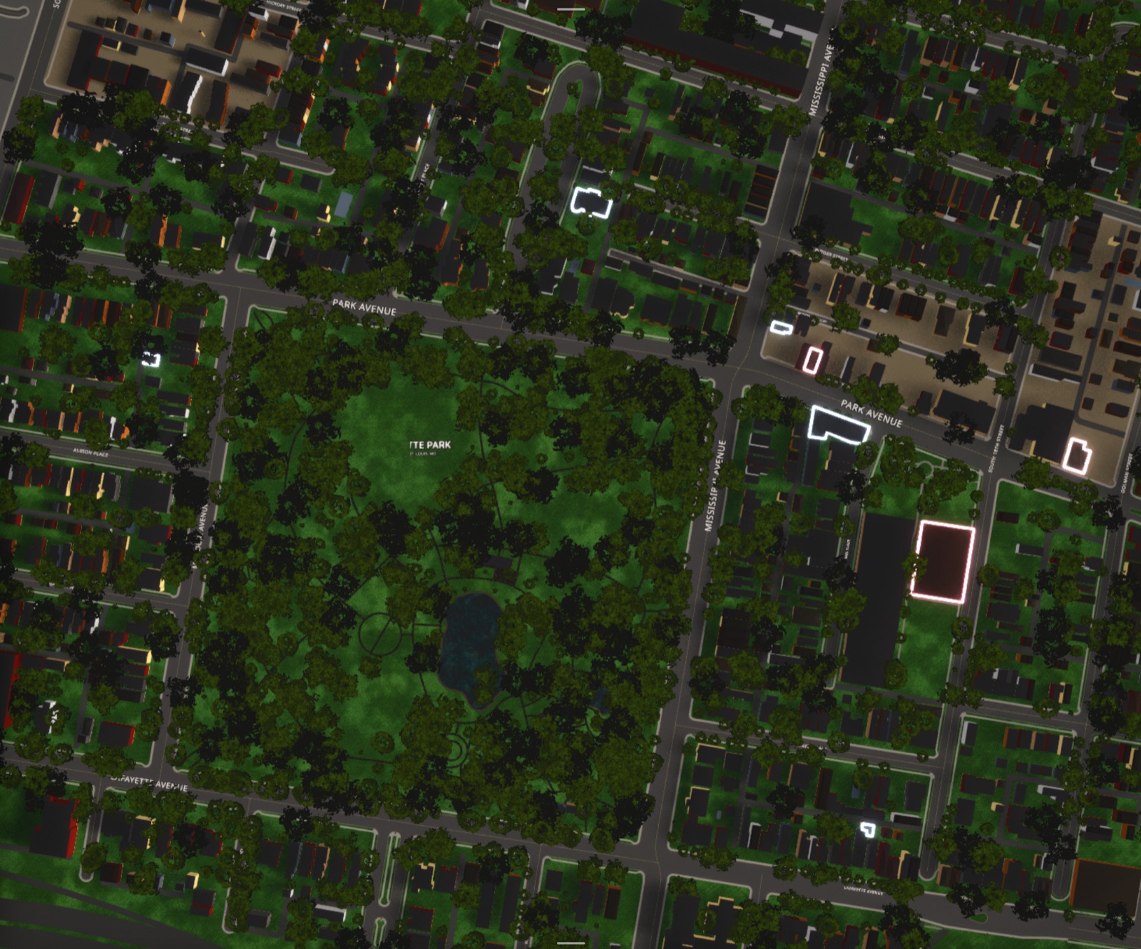 The neighborhood from directly overhead at night: a park at its centre, streets and rooflines around it, a few buildings outlined in neon.